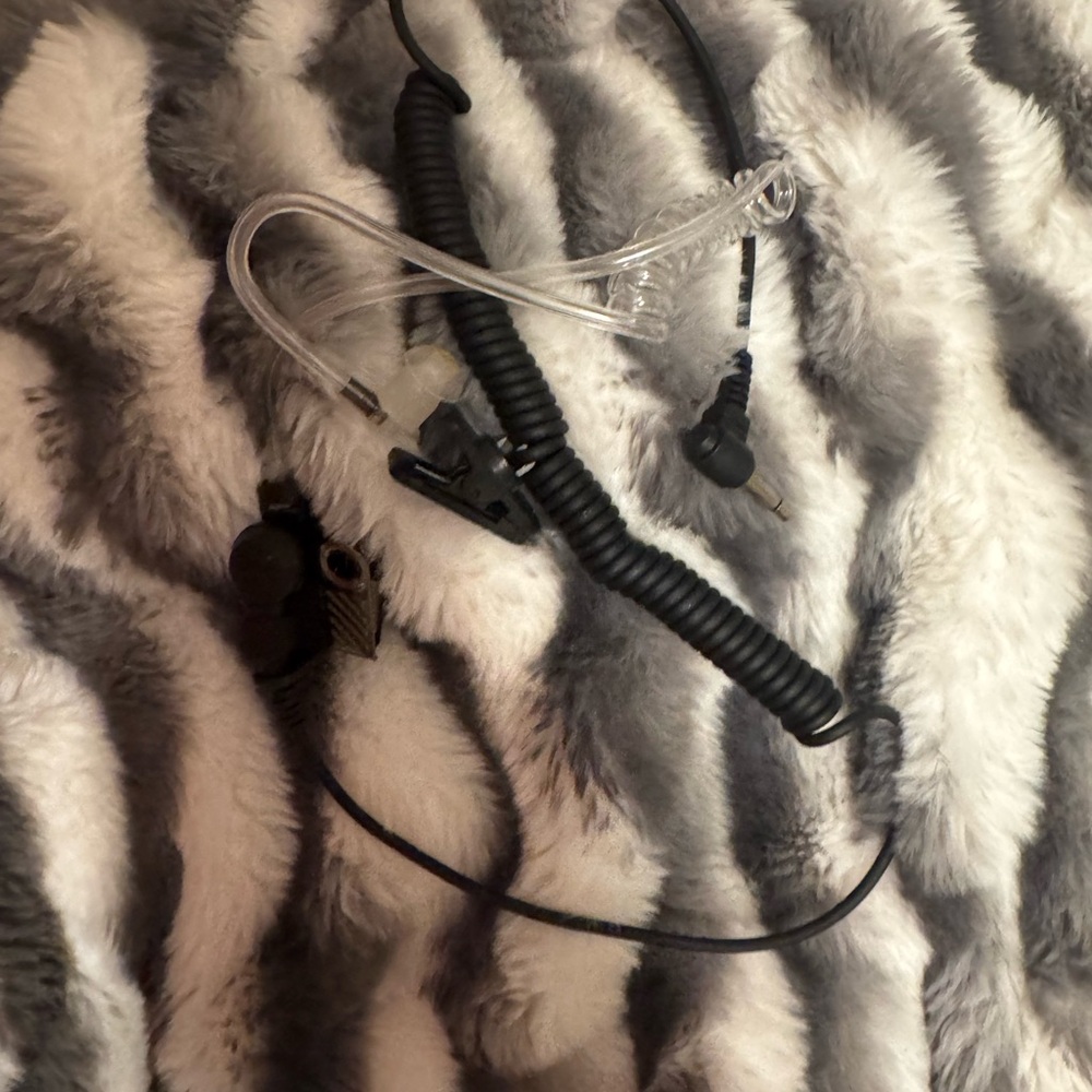 Two-Way Radio Earpiece with Black Coiled Cable